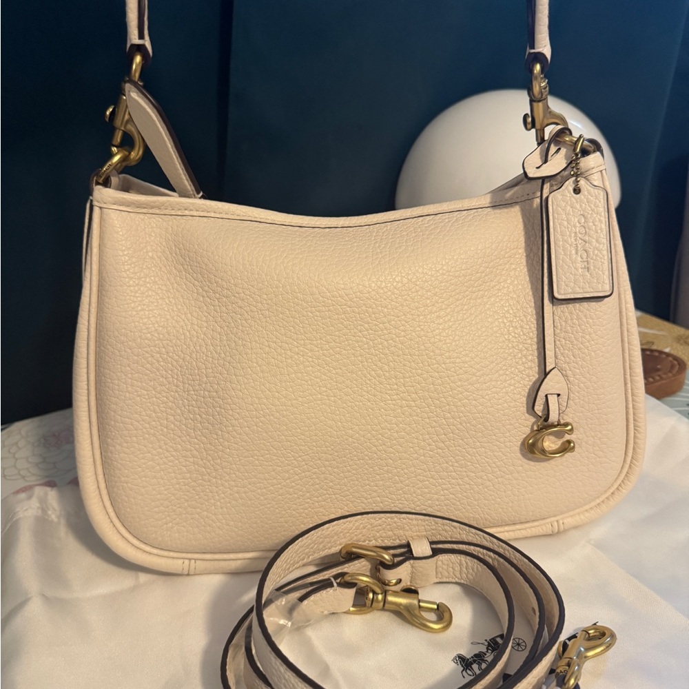 Coach Cary Pebbled Leather Shoulder Bag in Chalk/Light Beige with Gold Hardware